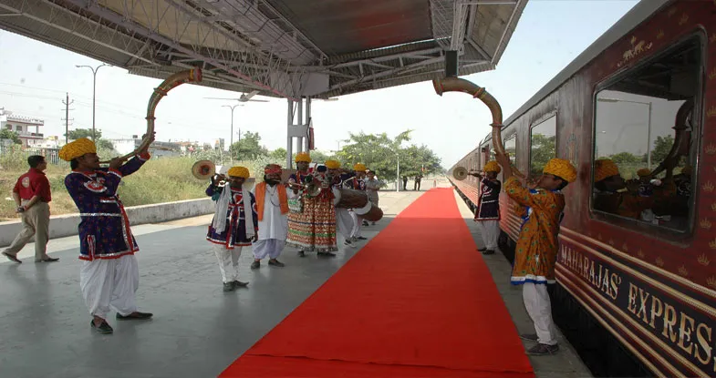 Welcoming Guests while boarding Luxury Train Image